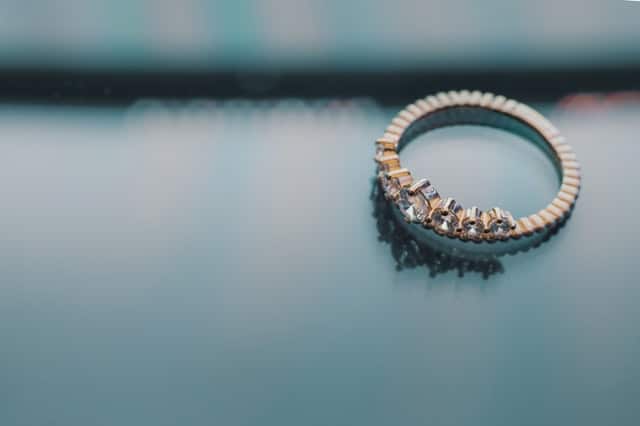 Gold colored diamond engagement ring